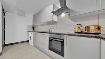 Estúdio | Cozinha privada | Geladeira, micro-ondas, fogão, cooktop