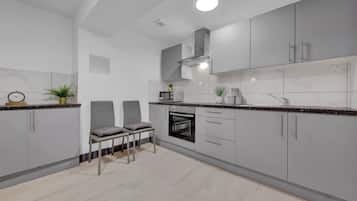 Estúdio | Cozinha privada | Geladeira, micro-ondas, fogão, cooktop