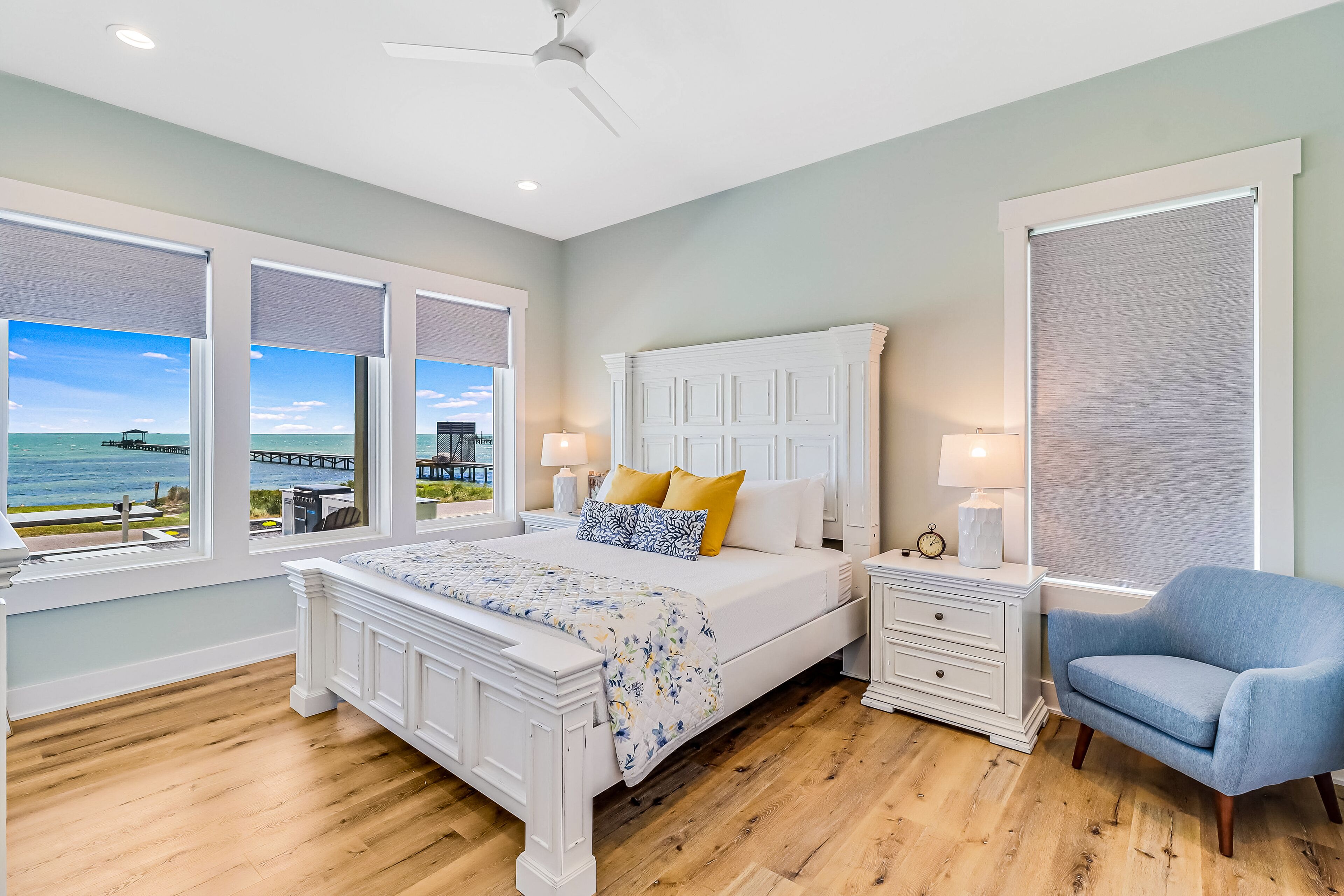 Gulf-view home with sunrise views over water, outdoor kitchen & beach access
