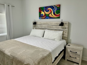 1 chambre, coffre-fort, fer et planche à repasser