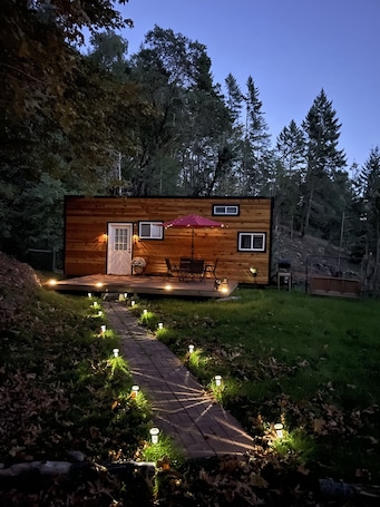 Exterior. Tiny House nestled into the Forest on 160 acre Playground.