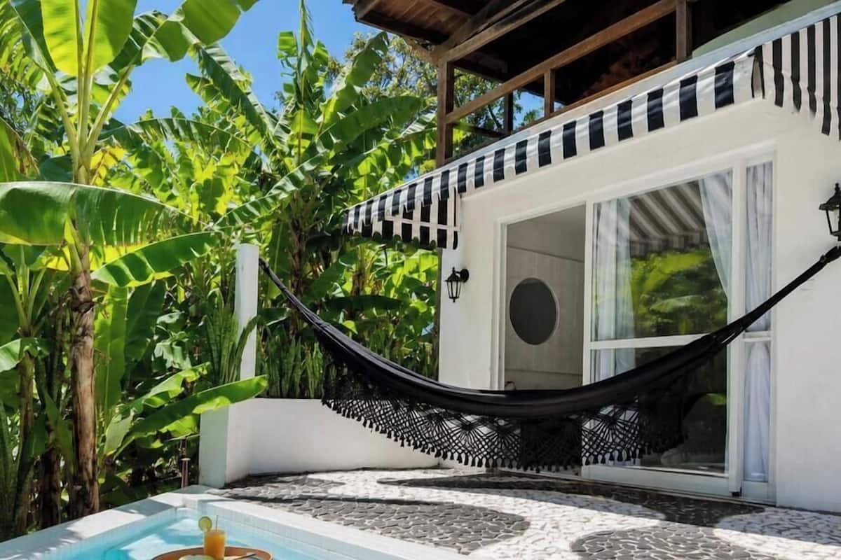 Suíte Room 4 com Piscina Aquecida Privativa - CasaIvan | Vistas al jardín