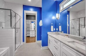 Jetted tub, hair dryer, towels, soap