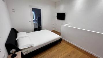 2 chambres, chambres insonorisées, fer et planche à repasser