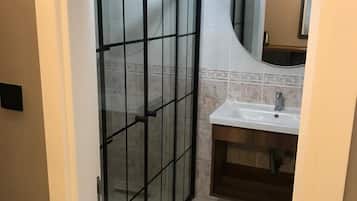 Elite Condo, 1 Queen Bed with Sofa bed, Smoking, City View | Bathroom | Shower, rainfall showerhead, hair dryer, slippers