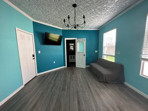 Living area - Grandmillennial one bedroom in Buffalo’s West Side (Buffalo)