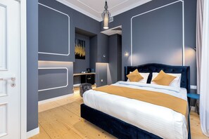 Ropa de cama de alta calidad y minibar 