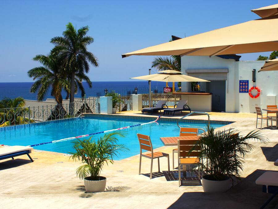 Outdoor pool, open 6:00 AM to 7:00 PM, pool umbrellas, sun loungers