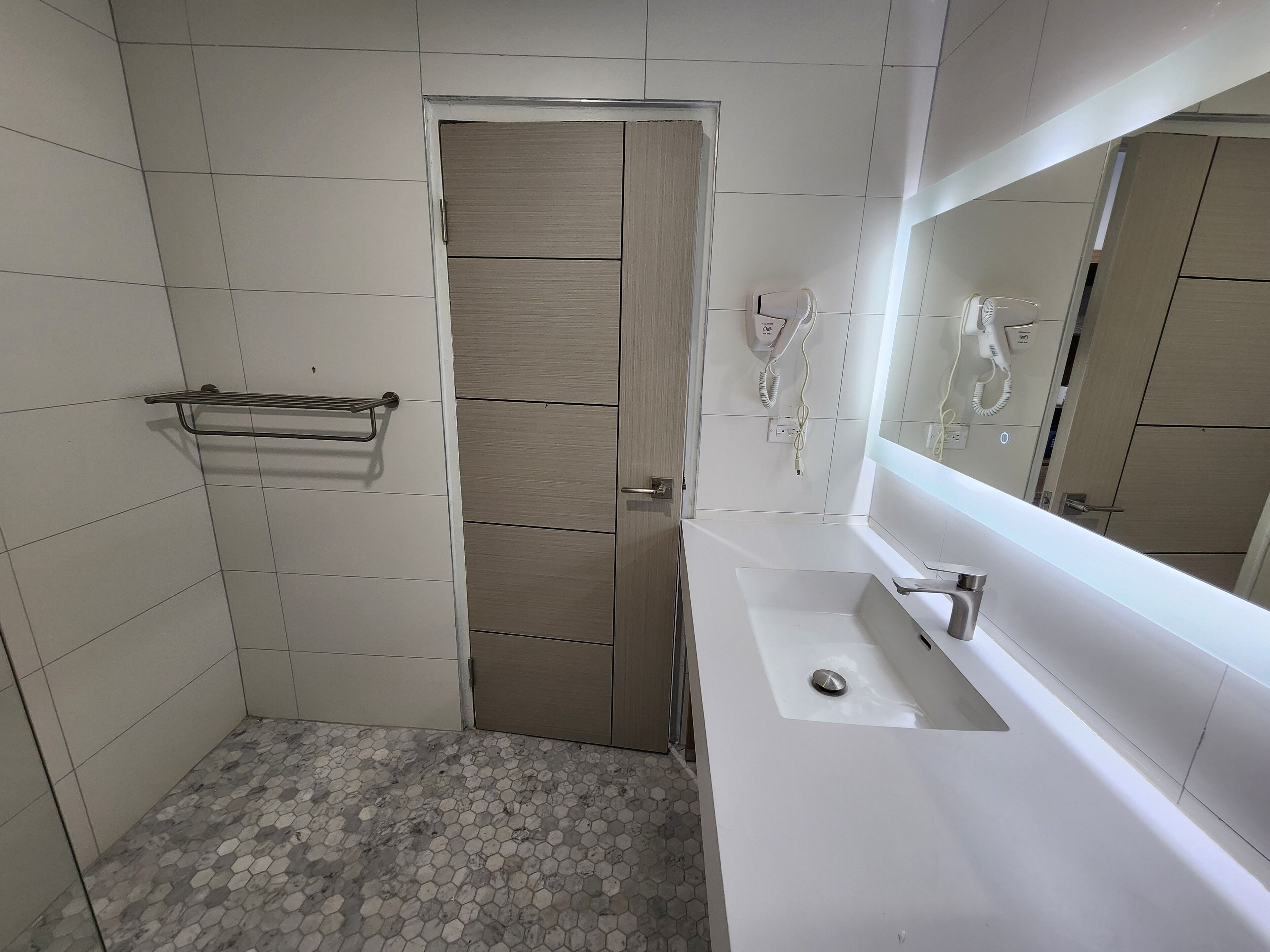 superior double room | bathroom | rainfall showerhead, free toiletries, hair dryer, slippers