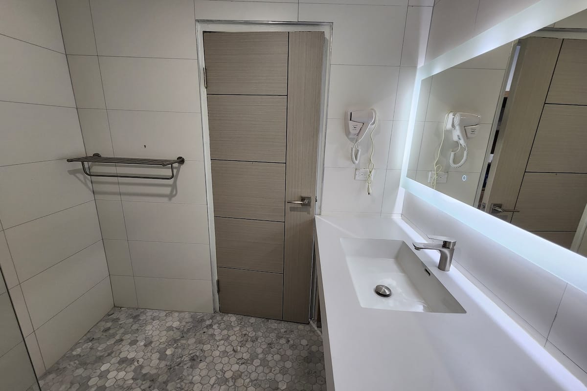 superior double room | bathroom | rainfall showerhead, free toiletries, hair dryer, slippers
