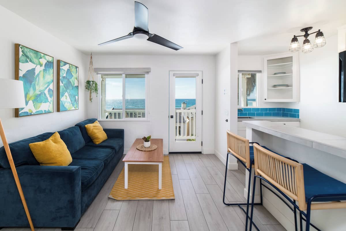 Condo, 1 Queen Bed with Sofa bed, Balcony, Ocean View (Unit 4) | Living area | 40-inch flat-screen TV with cable channels, TV