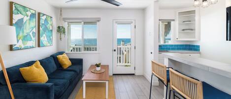 Condo, 1 Queen Bed with Sofa bed, Balcony, Ocean View (Unit 4) | Living area | 40-inch flat-screen TV with cable channels, TV