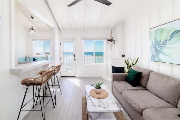 Condo, 1 Queen Bed with Sofa bed, Balcony, Ocean View (Unit 2) | Living area | 40-inch flat-screen TV with cable channels, TV