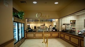 A restaurant with a counter, a refrigerated display, and a menu board. - 3BD/Vegas - Full Kitchen, Private Living Room, Pools and Hot Tubs! (Las Vegas)