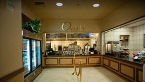 A restaurant with a counter, a refrigerated display, and a menu board. - 3BD/Vegas - Full Kitchen, Private Living Room, Pools and Hot Tubs! (Las Vegas)