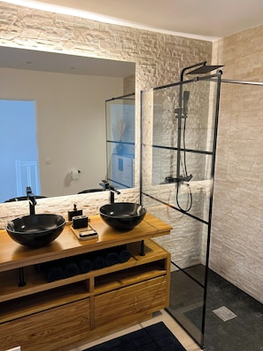Hair dryer, towels, soap, shampoo