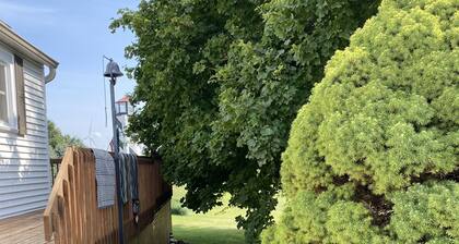 Cozy Farmhouse Retreat, Climb lighthouse, Acres to explore, Dogs ok, Amenities!