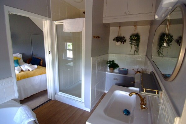 Family Suite | Bathroom | Hair dryer, slippers, towels, soap - The Anchor (Ely)