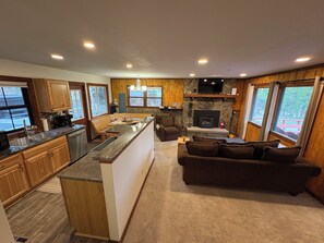 Smart TV, fireplace, books