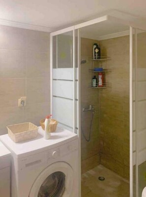 Hair dryer, soap, shampoo, toilet paper