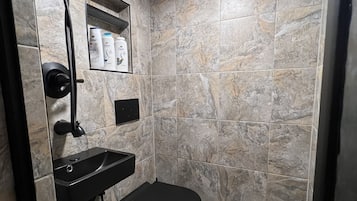 Shower, bidet, towels, soap