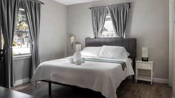 2 habitaciones, tabla de planchar con plancha y cuna de viaje