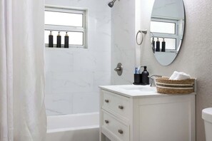 Hair dryer, towels, soap, shampoo