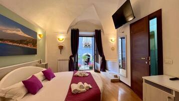 Deluxe Room | Pillowtop beds, minibar, desk, laptop workspace