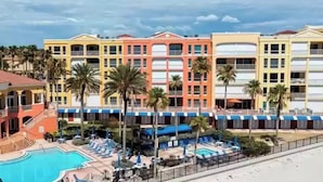 A hotel with a pool, multiple floors, and a beach view. - Luxury beachfront condo with magnificent views (North Redington Beach)