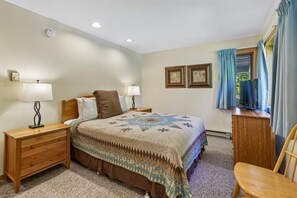 Queen Bedroom - This comfortable bedroom features a queen bed, bedside lighting and large windows overlooking the surrounding trees. - Make Yourself at Home D18 (Killington)