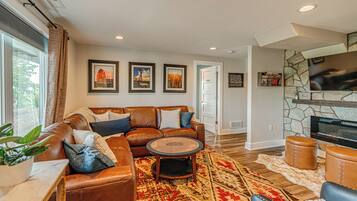 Smart TV, fireplace, books