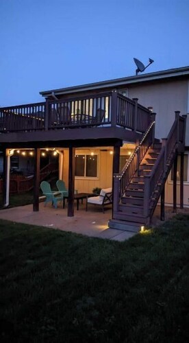 Central Location+ 2 living spaces+ covered patio!