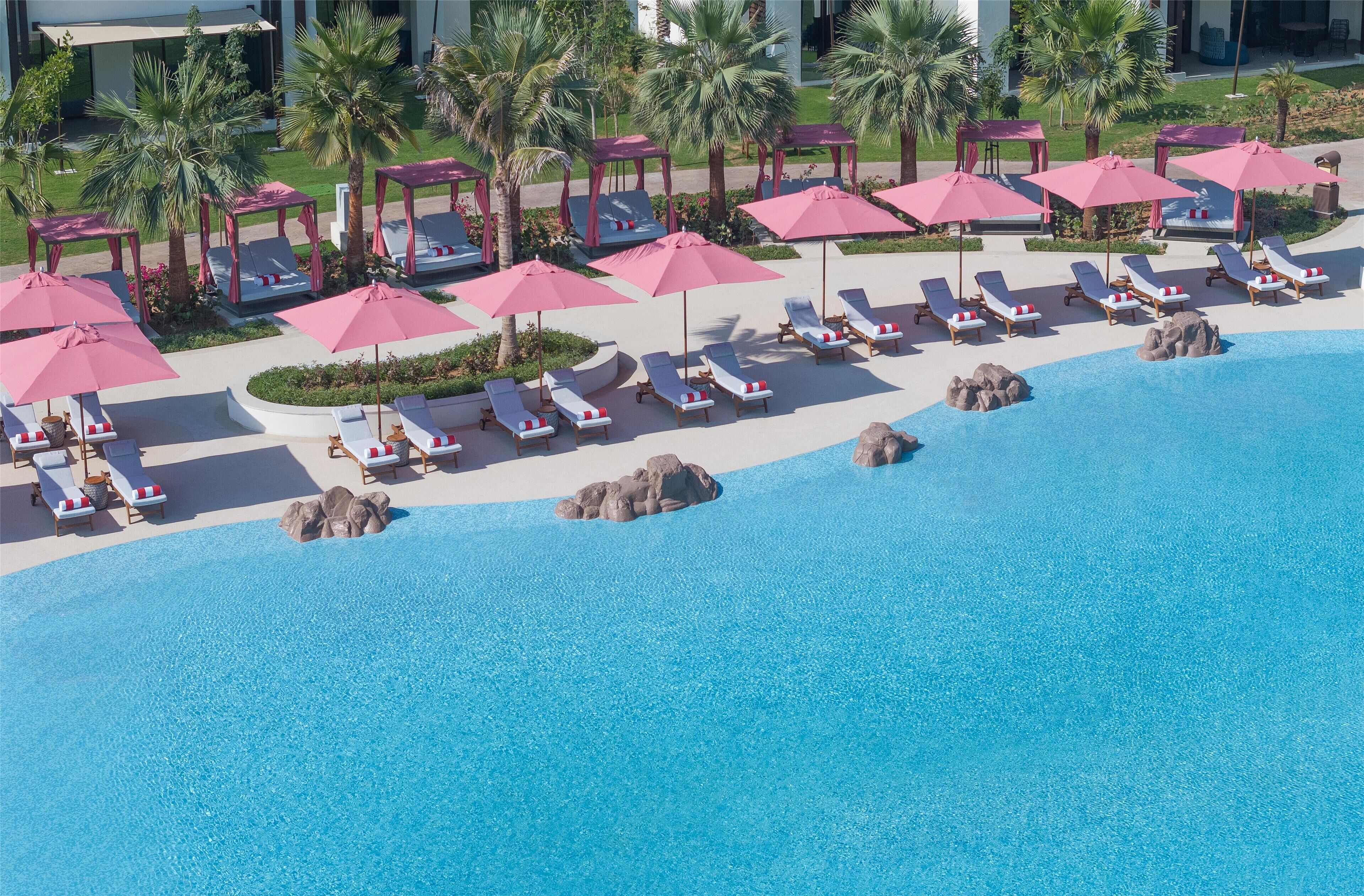 Outdoor pool, pool umbrellas, sun loungers