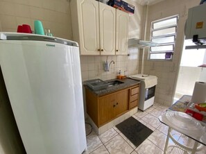 Private kitchen - <br>Cozy apartment in Praia Grande, 150 meters from the beach (Guilhermina Praia Grande)