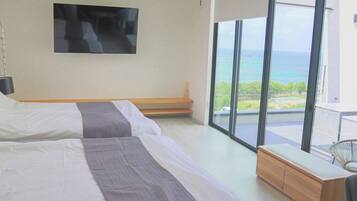 Superior Villa, Pets Not Allowed, Partial Ocean View | Down comforters, blackout drapes, bed sheets