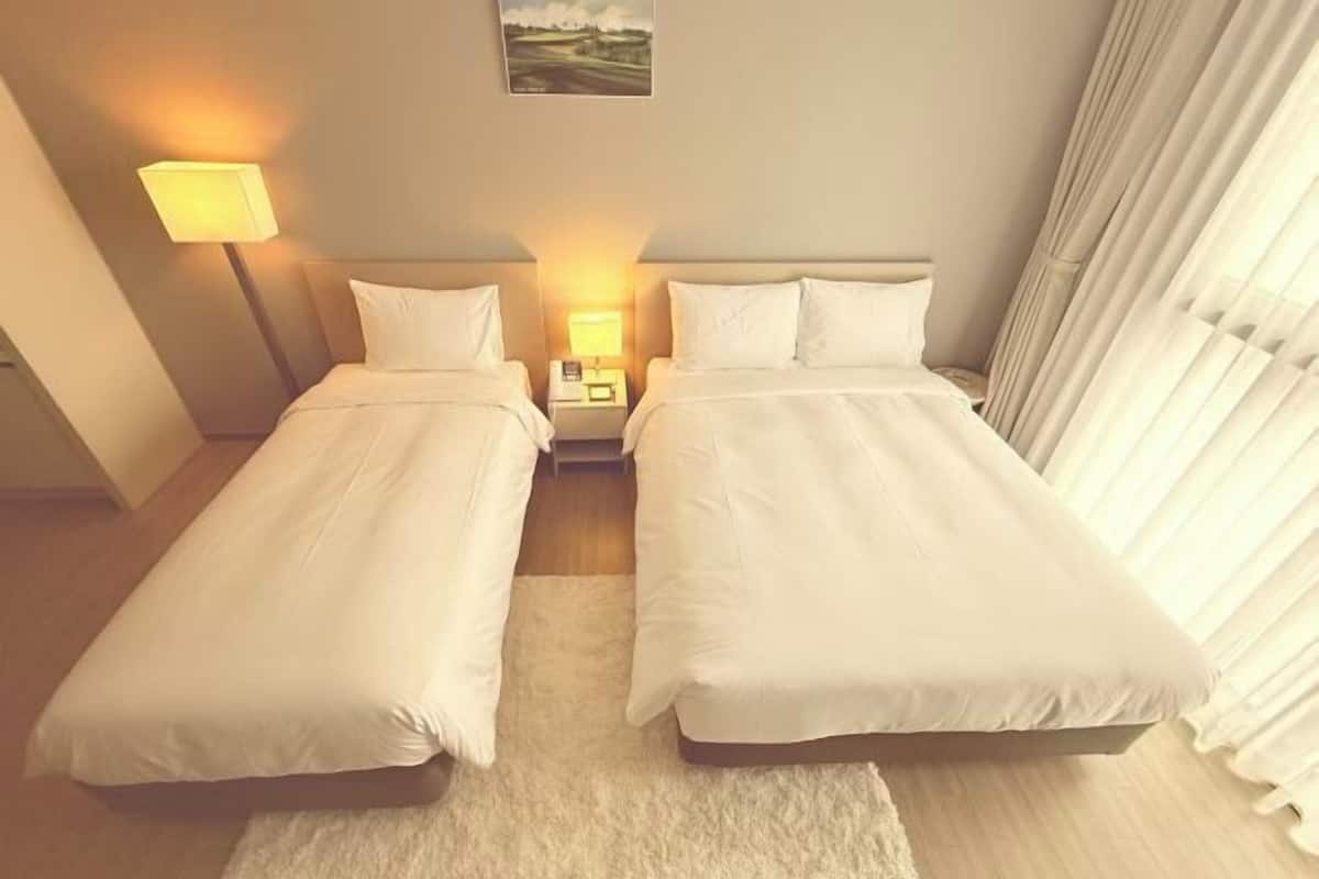 2 Schlafzimmer, Daunenbettdecken, Zimmersafe, Verdunkelungsvorhänge