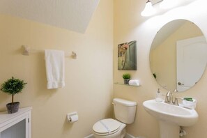 Bathtub, hair dryer, towels
