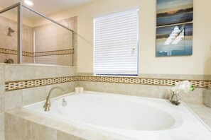 Bathtub, hair dryer, towels