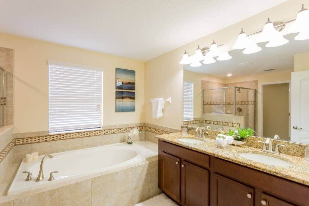 Bathtub, hair dryer, towels