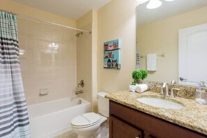 Bathtub, hair dryer, towels