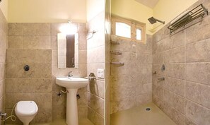 Deluxe Room | Bathroom | Shower, rainfall showerhead, free toiletries, towels - Fabexpress Bzoy Inn (Dehradun)