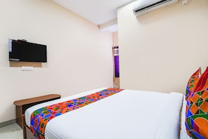 Egyptian cotton sheets, premium bedding, in-room safe, soundproofing - Fabexpress Uv Residency (Coimbatore)