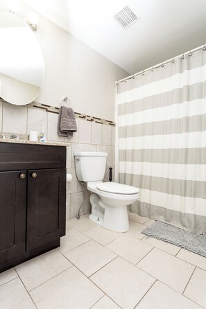Hair dryer, towels, soap, toilet paper