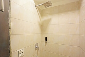 Deluxe Double Room | Bathroom | Rainfall showerhead, designer toiletries, bathrobes, towels