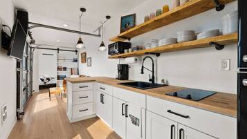 Fridge, microwave, stovetop, coffee/tea maker