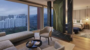 Premium bedding, down comforters, minibar, in-room safe