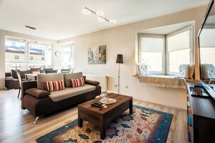 Studio Suite | Living room | 32-inch flat-screen TV with digital channels