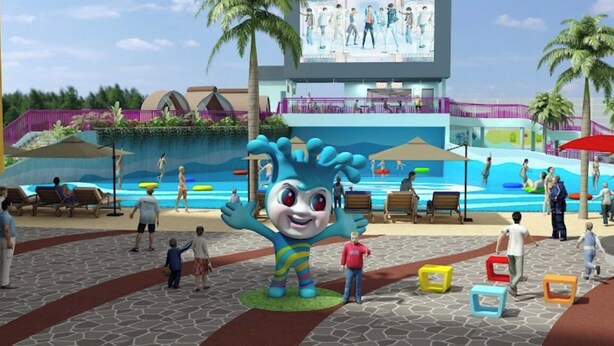 A water park with a large mascot, palm trees, and people enjoying the facilities. - Cosy Appartement Dans Quartier Calme à Proximité du Parc Aquatique (Kinshasa)