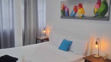 4 bedrooms, iron/ironing board, travel cot, WiFi