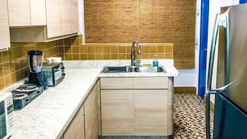 Fridge, microwave, coffee/tea maker, toaster